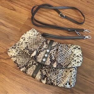 Brighton snake print crossbody, wristlet or clutch purse. Two detachable straps.